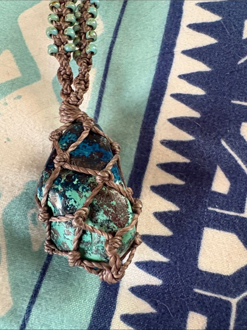 Handmade raw Chrysocolla Stone Necklace in brown macramé cage pendent